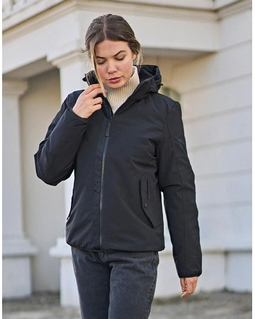 Chaqueta mujer urban adventure impermeable 135gsm