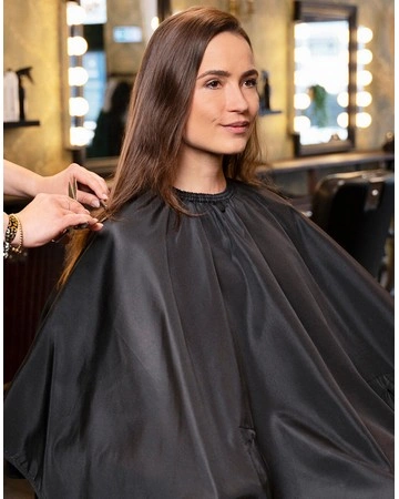 Delantal peluquería repelente agua profesional 85gsm